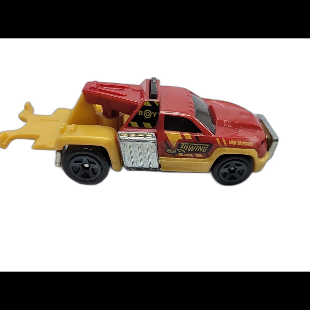 Hot Wheels Repo Duty from the 2013 HW City  series Pearl Red Tow Truck 1:64